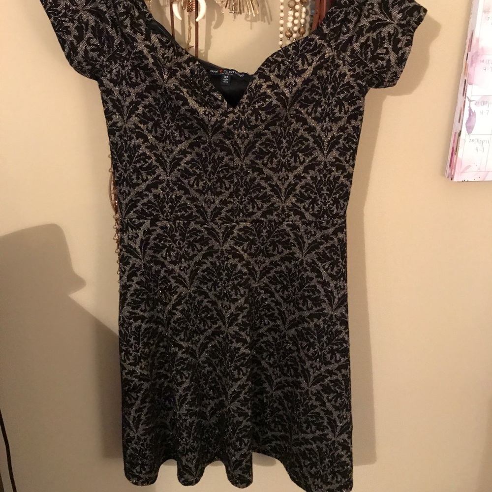 Off the shoulder gold and black dress